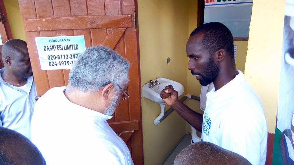 Samalex Representative Explaining Toilet Technology to J.J. Rawlings